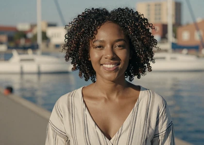 Woman at a navy waterfront on a sailor and navy dating site for military singles
